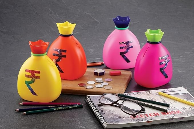 Plastic Money Saving Bank for Kids – Coin Bank in Rupee Bag Shape (Random Color)