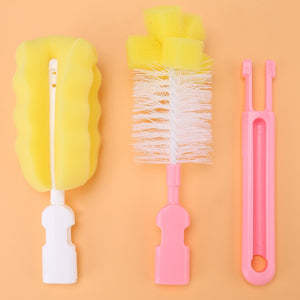 Three baby bottle brushes: sponge, bristle, and a handle component.bottle brush, baby, cleaning, nursery.