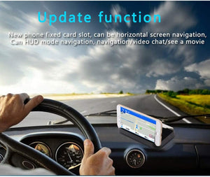 A smartphone displaying a navigation app rests in a black CONRAL car HUD holder on a car dashboard, reflecting onto the windshield. Hands are on the steering wheel. CONRAL, car HUD holder, phone mount, car accessories, navigation.