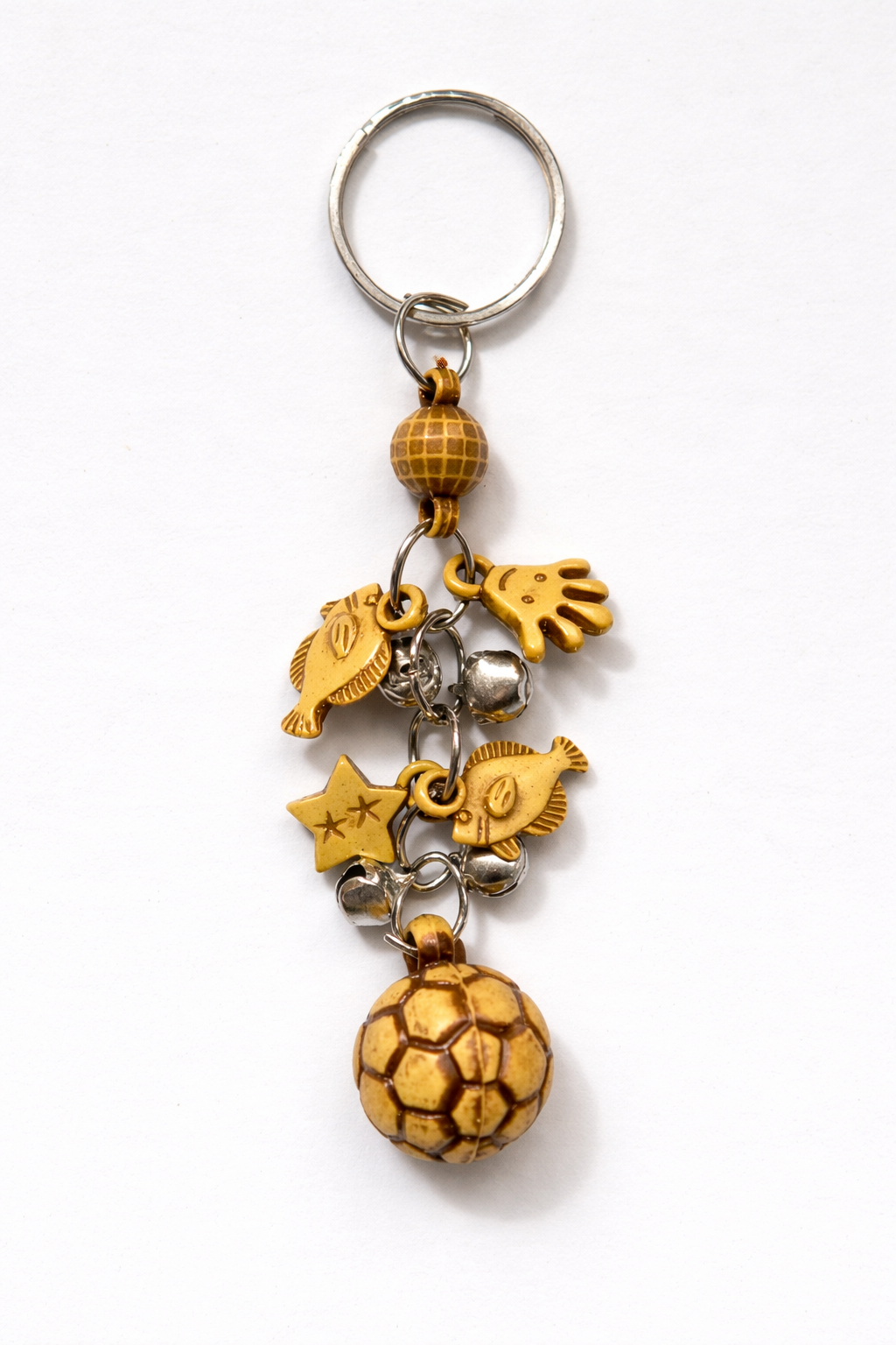 Stylish golden charm keychain featuring a mini soccer ball, fish, star, hand (Pack of 3)