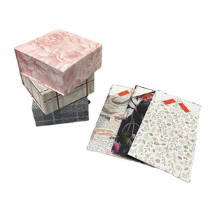 Close-up showcasing the random print design of the foldable gift box, highlighting its unique aesthetic appeal suitable for various gifts. Ideal for birthday presents, wedding favors, and corporate giveaways, this easily assembled box is a popular choice for both gifts for her and gifts for him.