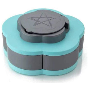 A Blue flower-shaped rotating tray. snack tray, rotating, nuts, dried fruit, serving.