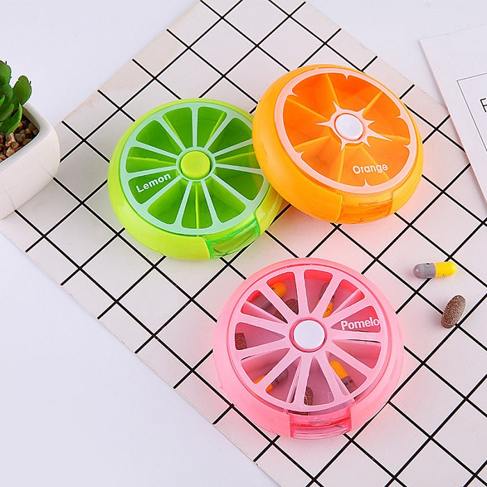 7 Compartment Weekly Pill Box – Rotating Round Storage Box for Medicines (Random color- Pack of 1)