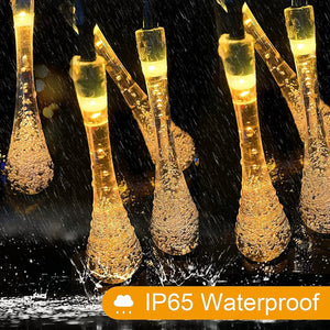 Battery-operated fairy lights with water drop design for indoor and outdoor use