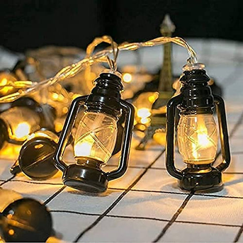 Black lantern string lights for outdoor patio and garden decoration with warm white glow