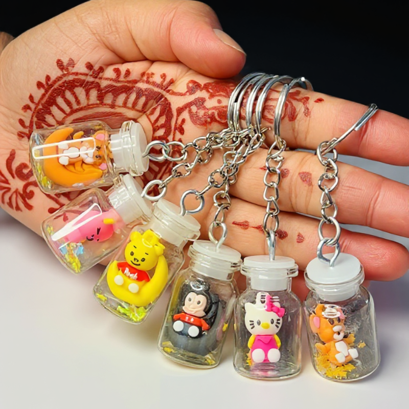 Cute Mini Bottle Keychains – Cartoon Character Charms for Bags & Keys - Random Cartoon (Pack Of 3)