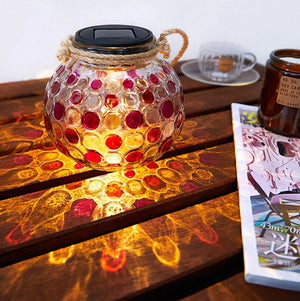 Eco-friendly solar-powered outdoor lamp in a spherical glass design, with colorful illumination and a metal stand base - Home decor Items, Home Accessories