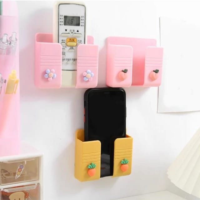 Fancy Wall Mounted Mobile Stand – Self Adhesive, No Drill Mobile Holder for Wall, Bedside & Kitchen Use (Random color-Pack of 1)