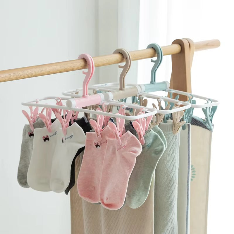 12 Clip Foldable Drying Clothes Hanger – Portable Laundry Hanger for Socks, Underwear & Baby Clothes (Random Color)