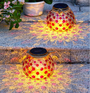 Nighttime shot of a glowing solar crystal lamp, used for decorative outdoor lighting on pathways or garden spaces - Home Decor Items, Home Accessories