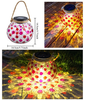 Close-up of a glass ball solar lamp emitting warm and cool hues, ideal for garden, patio, or balcony decoration - Home Decor Items, Home Accessories