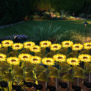 Solar-powered sunflower lights illuminating the garden at night