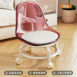  Acrylic swivel chairs in pink white cushions and bases are on a Wooden rug.Acrylic chair, swivel chair, modern chair, office chair.