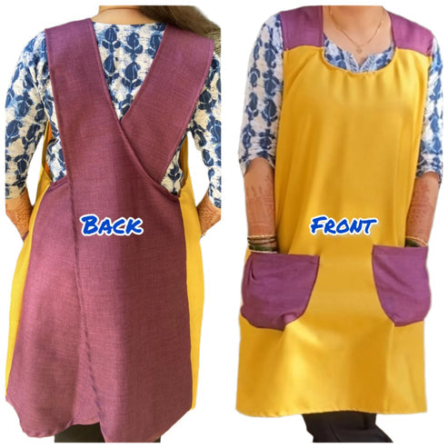 A woman wearing a yellow and purple pinafore apron with two front pockets over a blue and white patterned top.With back and Front.