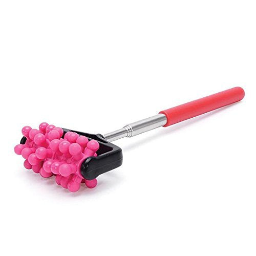 A telescopic back roller with pink rollers and a red handle lies diagonally. back roller, massager, pain relief.