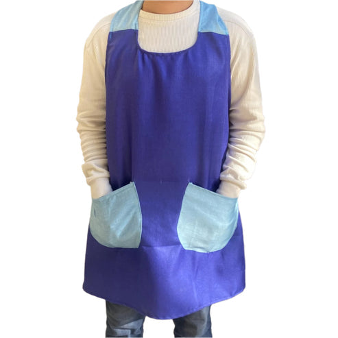 A man wearing a Blue and Navy blue apron with two front pockets 