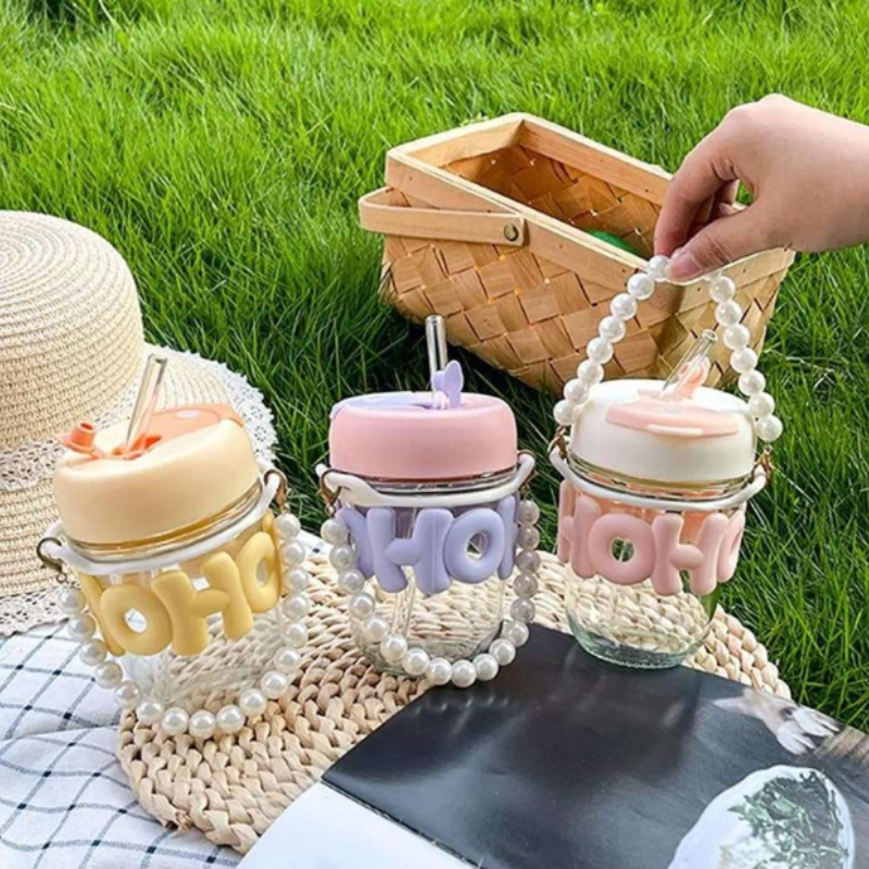 OHO Glass Drinking Cup with Sleeve & Pearl Bracelet – Stylish Reusable Glass Mug for Hot & Cold Beverages(Random color-Pack of 1)