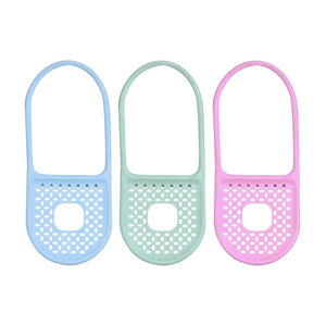Three foldable silicone sink caddies in light blue, light green, and light pink are arranged vertically against a white background. Each caddy has a hanging loop and a perforated bottom with a central square opening.sink caddy, sponge holder, sink organiser, kitchen organiser, dish sponge holder, silicone caddy, foldable caddy, kitchen accessories, household items, kitchen items, bathroom storage.