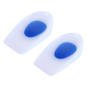 A pair of white silicone heel cups with blue gel inserts is displayed against a white background.silicone heel cup, heel cushion, heel support, foot care, shoe inserts, orthopedic insoles, health and personal care.