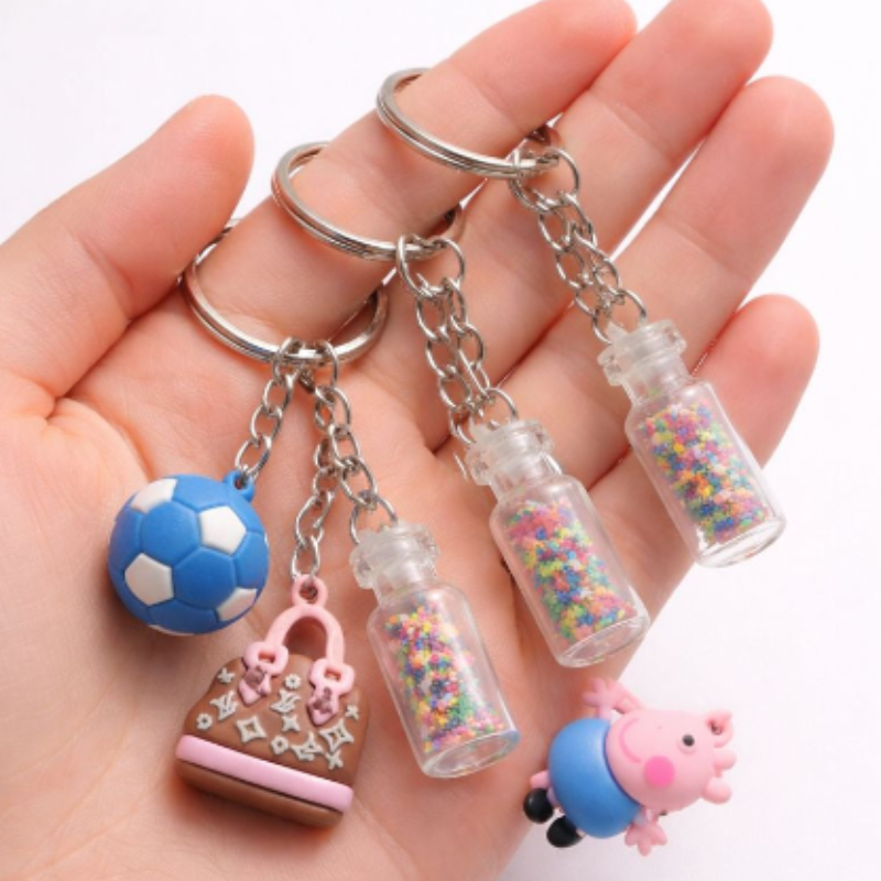 6 Pcs Glitter Bottle & Character Keychain – Mini Star Glitter Bottles with Soccer Ball Charm, Cute Bag & Key Accessories(Random Character)