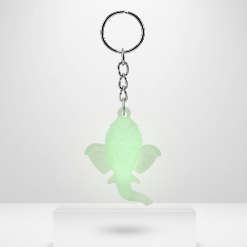 12 Pcs Lord Ganesh Ji Face Glow-in-the-Dark Radium Keychain – Auspicious Luminous Key Ring