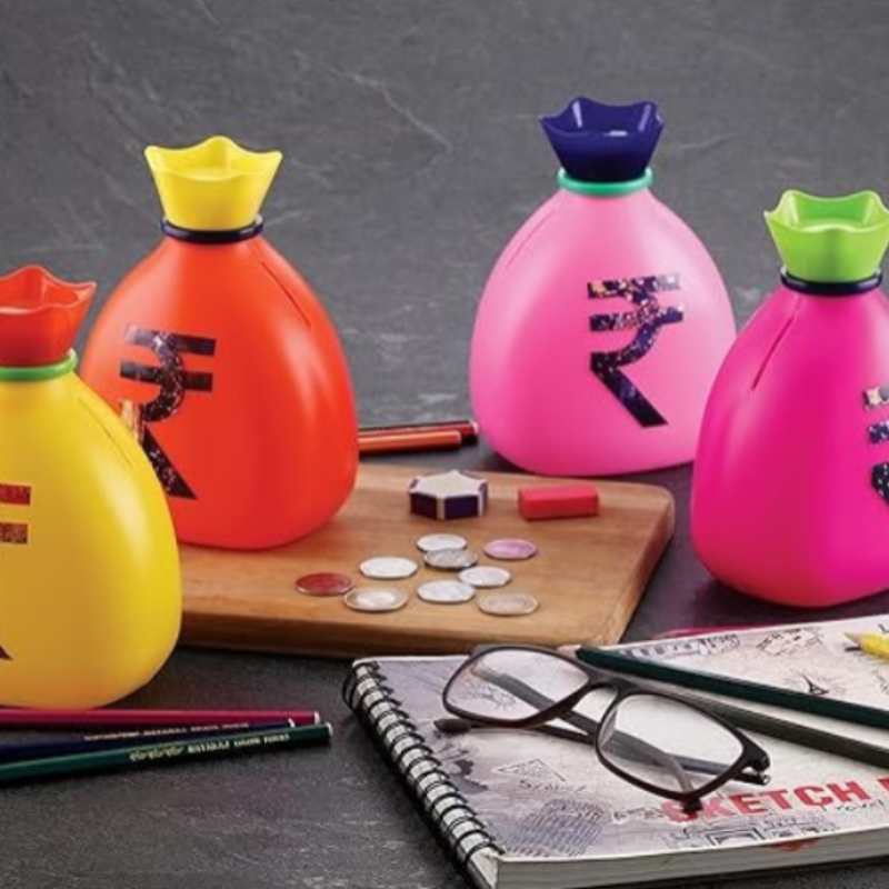 Plastic Money Saving Bank for Kids – Coin Bank in Rupee Bag Shape (Random Color-Pack of 1)