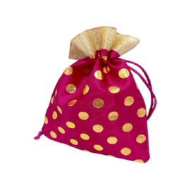 Pink and golden color polka dot potli bag is shown for people who wants to buy potli bag online.