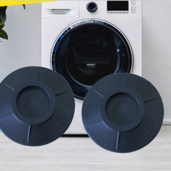 2 anti-vibration rubber mats for washing machines are shown in front of a washing machine.