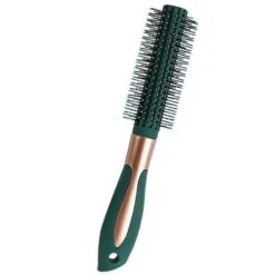 Green and copper color styling round brush for hair.