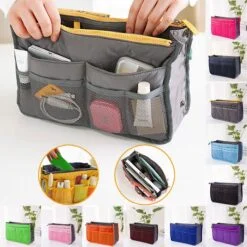 Grey color zipper toiletry bag is surrounded by multiple other toiletry bags