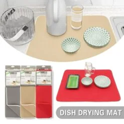 A jug, glass, and saucer is kept on a microfiber dish drying mat for kitchen.