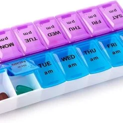 14 Grid weekly pill case in purple and blue color.