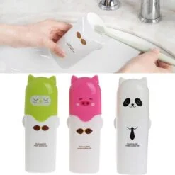 Cartoon toothbrush box presented in green, pink, and white color.