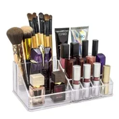 Lipsticks, brushes, perfumes, and foundations are organised in a 16 cavity acrylic makeup storage.