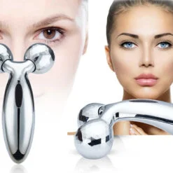 Silver color 3d face massager is shown along with a lady's face.