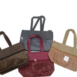 Printed tote is shown in brown, maroon, blue, and beige color