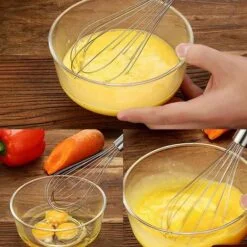 Woman is using stainless steel whisk for cooking.