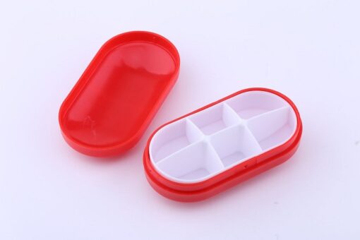 6 Compartment Red color travel pill case.