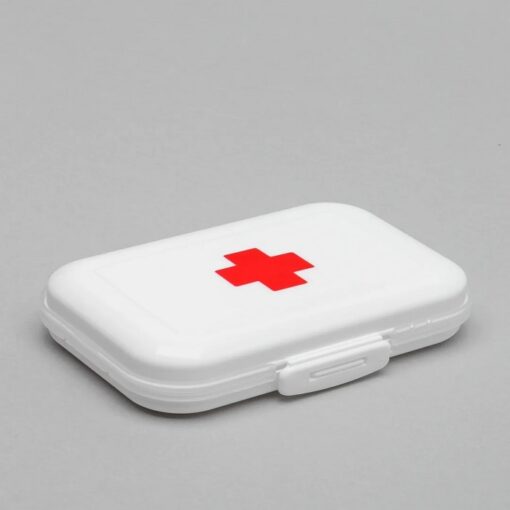 White color travel pill case.
