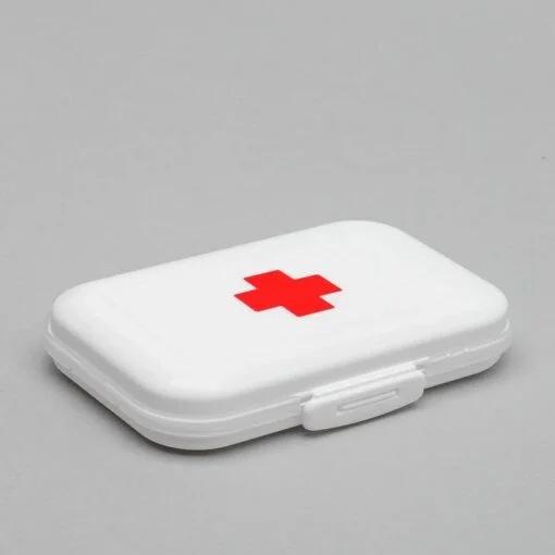 White color travel pill case.