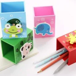 Wooden pen holder is presented in 4 different color and pattern