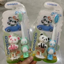 Two panda toothbrush packets.