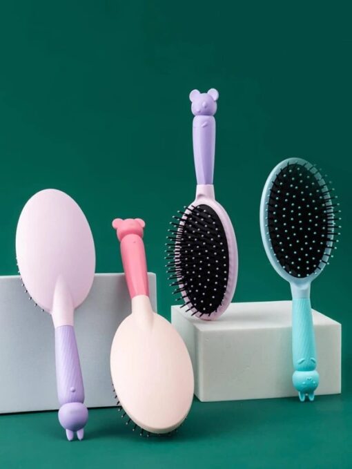 Cushion paddle hair brush is displayed in 4 different colors.