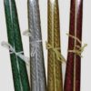 Glitter candle is presented in green, silver, yellow, and red color.