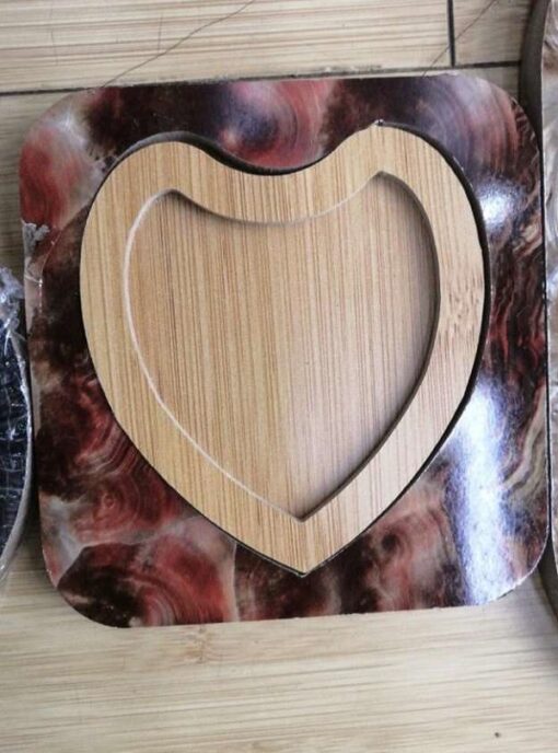 Heart shape wood serving plate.