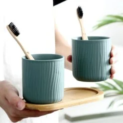 Brush holder is placed on a wooden cup tray
