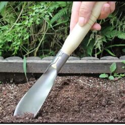 Pointed gardening shovel is being used in gardening