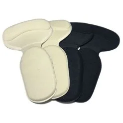 2 Cream color shoe cushion pads and 2 black color shoe cushion pads.