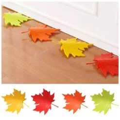 Maple leaf door stopper is presented in green, orange, yellow, and red color near white color door