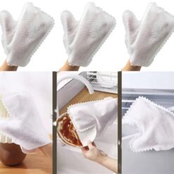 White color disposable cleaning gloves are worn by a lady while washing dishes and doing other household chores.
